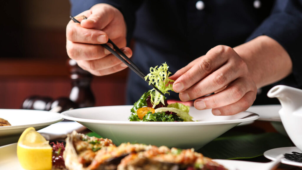 Chef plating food